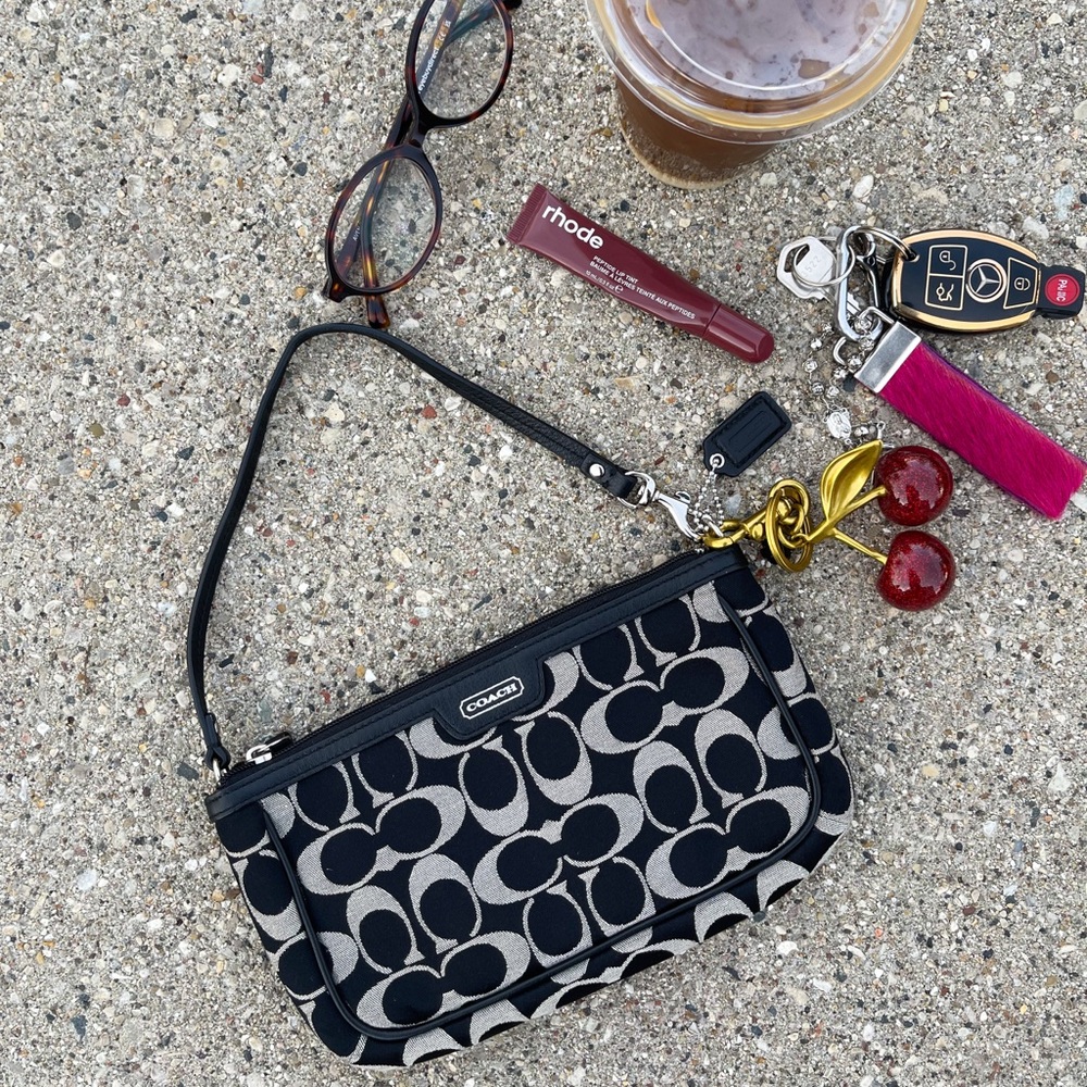 Coach Black and Cream Signature Wristlet with Cherry Charm